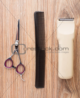 Barber accessories on wooden table