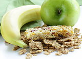 granola bar, green apple and banana - healthy eating