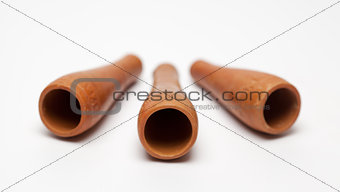 Three Smoking clay pipe