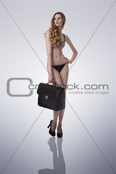 business woman in bikini golden city on back