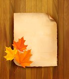 Sheet of paper with autumn leaves on wooden background. Vector i