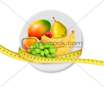 Diet meal. Fruit in a plate with measuring tape. Concept of diet
