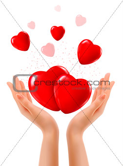 Holiday background with two hands and red hearts. Vector