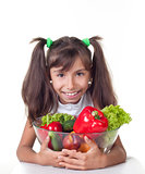 beautiful little girl with vegetables