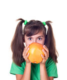 little girl with grapefruit
