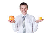 Man showing glass of orange juice and fruit to the camera