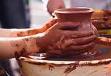 Potter making the pot in traditional style.