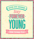 Stay forever young inscription on beautiful background.