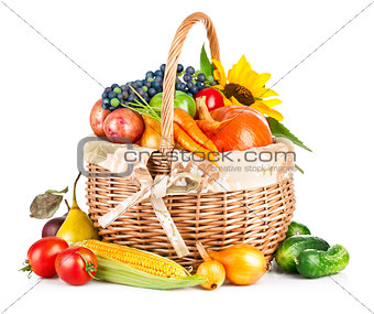 autumnal harvest vegetables and fruits in basket
