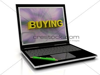 BUYING message on laptop screen 