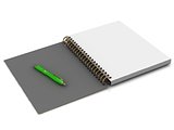 Notebook with a spiral and a green pen