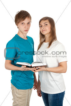 boy and a girl with an open book