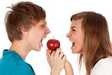 boy and a girl biting the apple