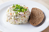 russian salad olivier served with onion