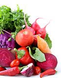 assorted different red vegetable (tomato, pepper, chili, carrots, beets, cabbage, radishes)