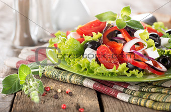 Vegetable salad on a wooden table