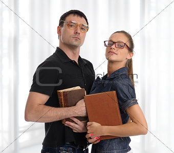 Nerd couple with books