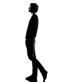 young man silhouette walking