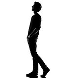 young man silhouette walking  happy laughing