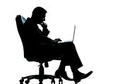 one business man computer computing sitting in armchair silhouet