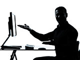 one business man silhouette computer computing showing gesture