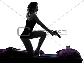 woman in bed waking up angry silhouette