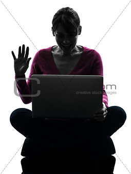 woman saluting computing laptop computer silhouette