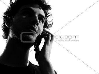 young man silhouette telephone