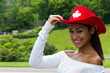 Pretty Canadian girl in a red hat