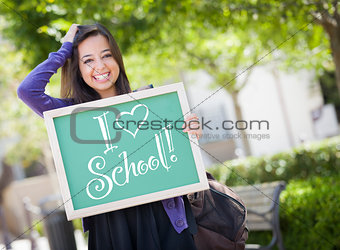 Mixed Race Female Student Holding Chalkboard With I Love School