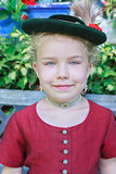 Portrait of a young Bavarian girl with hat