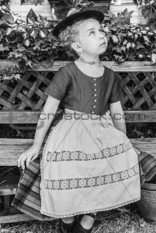 Black and white portrait of a girl in a dirndl