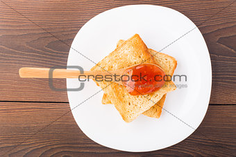 Toast with jam on a plate