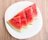 Watermelon slices on white plate