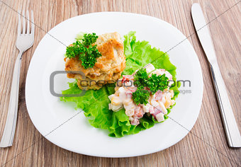Chicken cutlets with salad on a plate