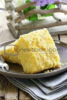 portion of cheesecake with orange flavor on the plate