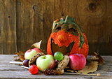 Halloween pumpkin Jack O'Lantern on a wooden background