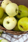 Fresh apples in a basket 