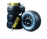 wheels and shock absorbers on a white background