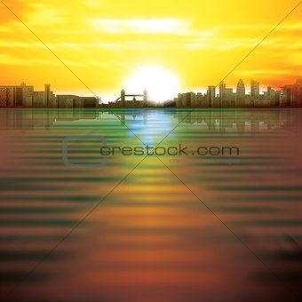 abstract background with sunrise and silhouette of London