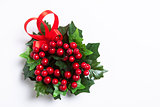 Christmas berries garland with red ribbon