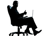 one business man computer computing thumb up sitting in armchair