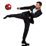 one business man playing kicking soccer ball