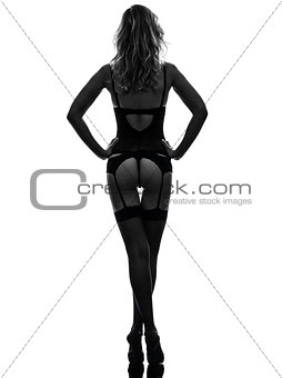 rear view sexy woman standing panties underwear hosiery silhouet