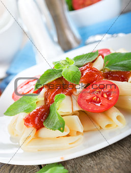 Tomatoes and ketchup on pasta