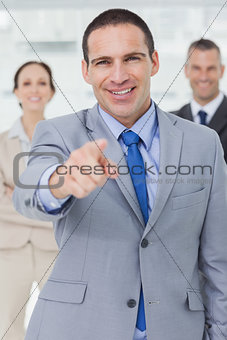 Entrepreneur posing pointing out at camera