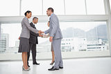 Business people meeting shaking hands