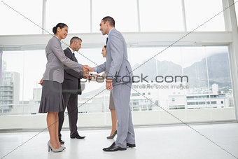 Business people meeting shaking hands