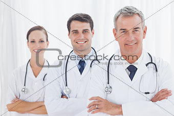 Smiling doctors posing together
