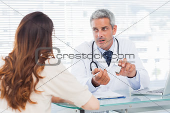 Doctor talking with his patient seriously